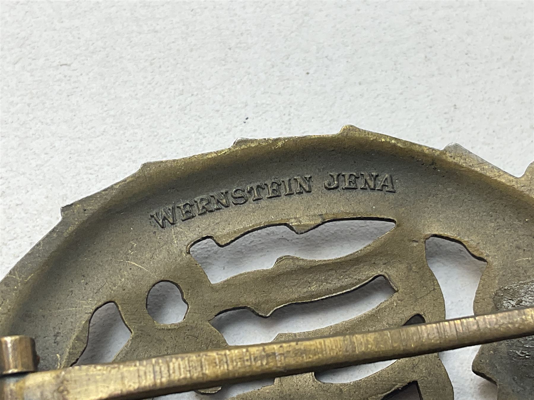 Two WW2 German Sports badges - SA sports badge marked verso 'W.Redo Eigentum D. Obersten SA. Fuhrung Saar Lautern'; and DRL sports badge marked verso 'Wernstein Jena D.R.G.M. 35269' (2)