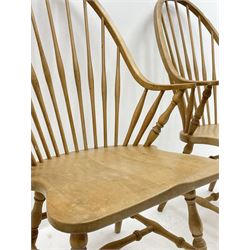 Set six American style Windsor dining chairs, shaped hoop and stick backs, dished seats, turned supports joined by stretchers 