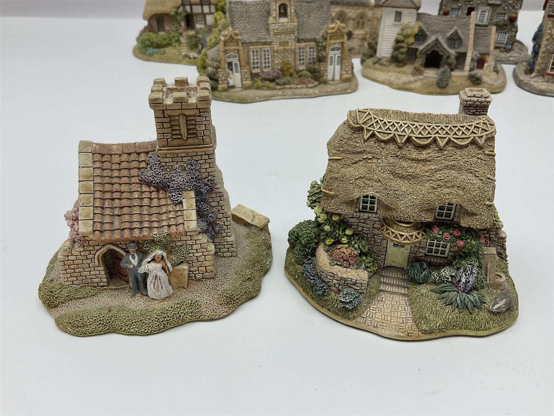 Twenty five Lilliput Lane, to include Village School, Greensted Church, The Chocolate House etc 