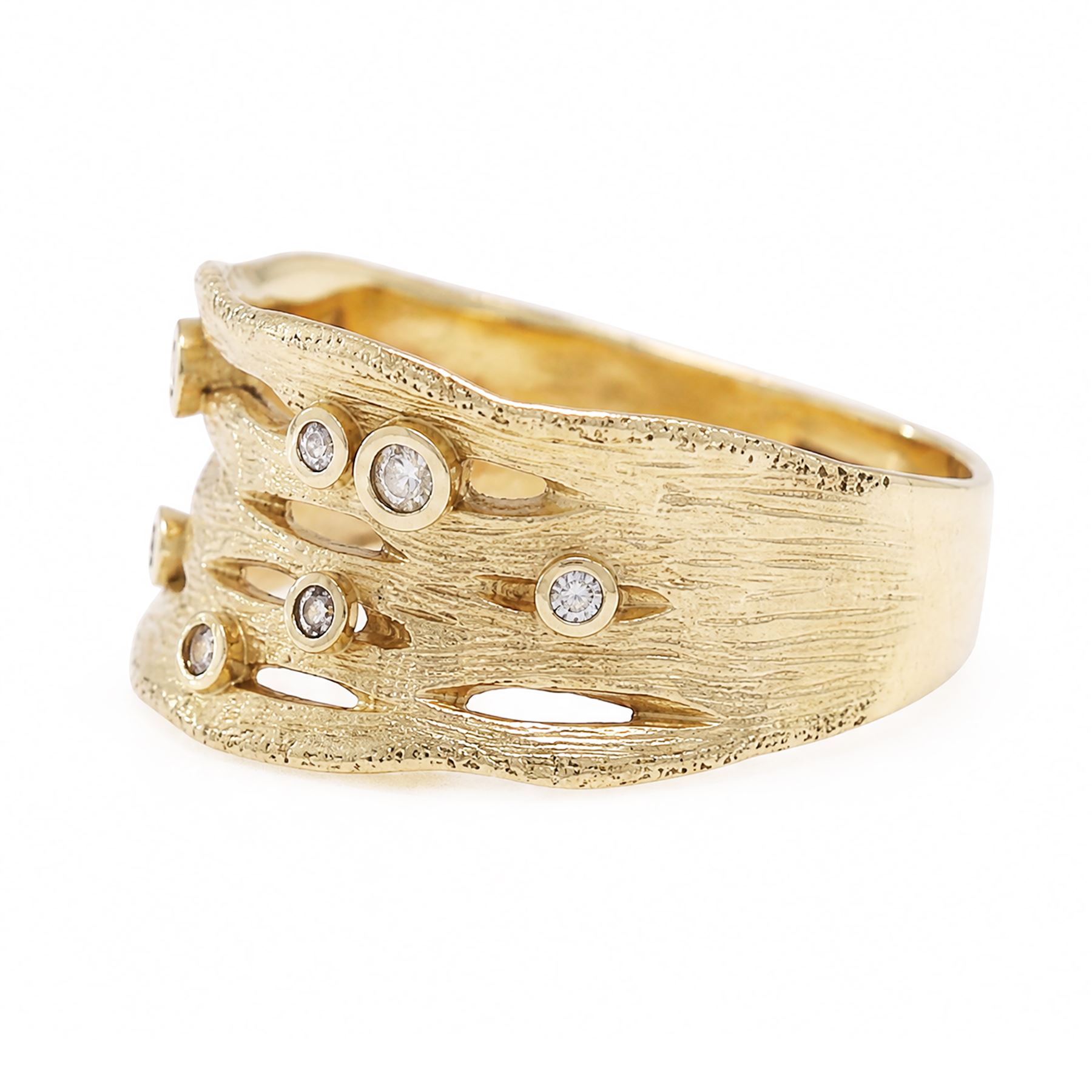 9ct gold diamond bubble ring, bezel set with seven round brilliant cut diamonds, in a textured pierced design setting, Birmingham 2008
