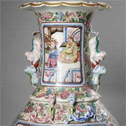 Large pair of 19th century Cantonese famille rose vases, each painted with various courtly scenes, including a display of warriors fighting on horseback before an official and his attendants, double Buddhist lion handles and applied at the shoulders with chilong, the lower band painted with Greek key motif, H58cm (2)