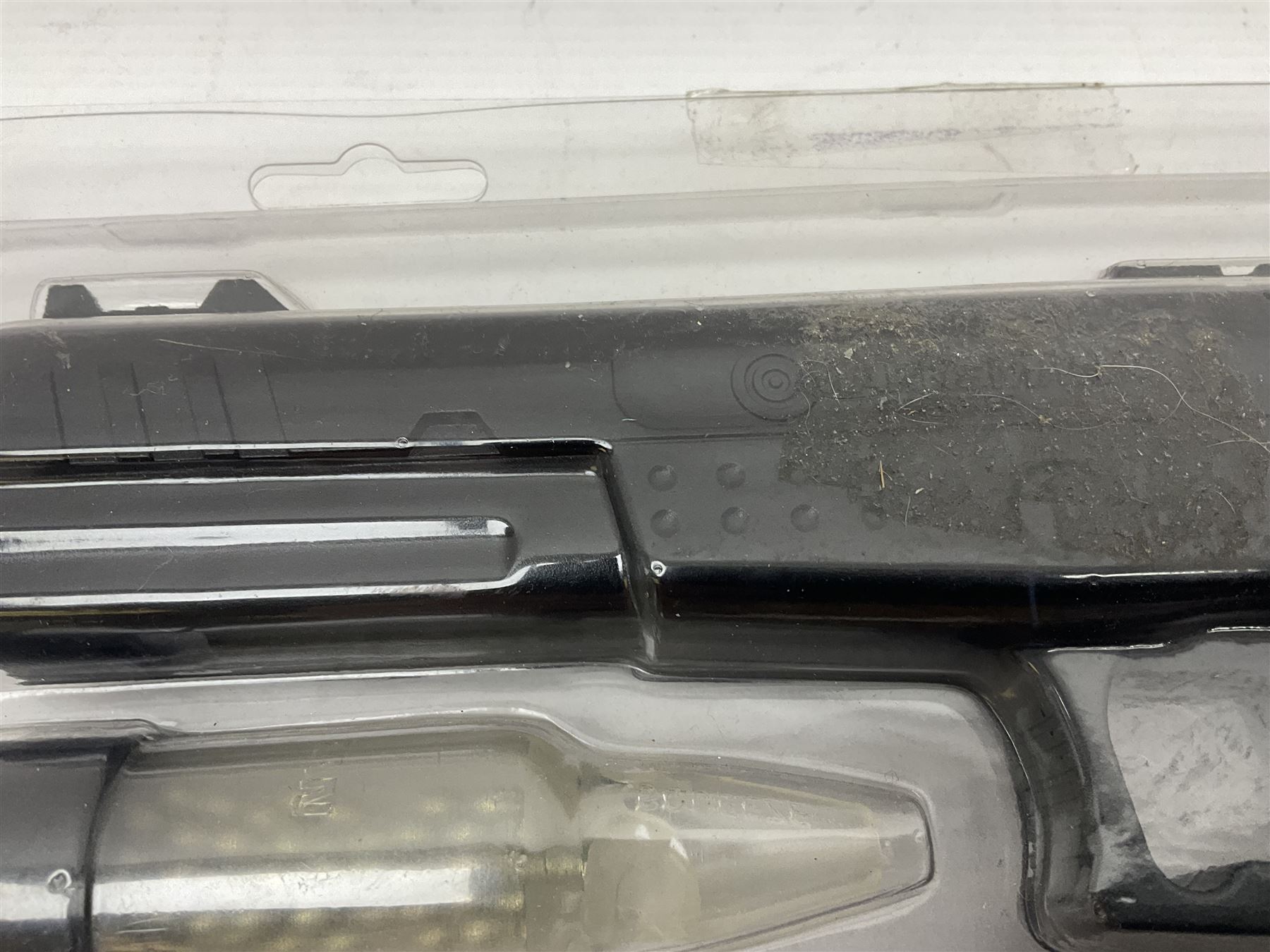 Marksman 1018 spring action BB pistol, serial no.121912951321, L27cm in original packaging with ball dispenser; and KWC .177 cal. CO2 revolver, serial no.31128882, L31cm (2)  NB: AGE RESTRICTIONS APPLY TO THE PURCHASE OF AIR WEAPONS.