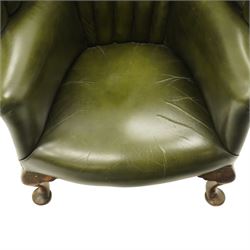 Georgian design green leather barrel-back wingback armchair, pleated upholstered back with shaped wings over scroll arms and sprung-seat, close nailed border, raised on cabriole supports terminating in pad feet