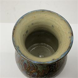 John Egerton (c1945-): studio pottery stoneware vase, decorated with artichoke hearts upon a mottled blue ground, H21cm