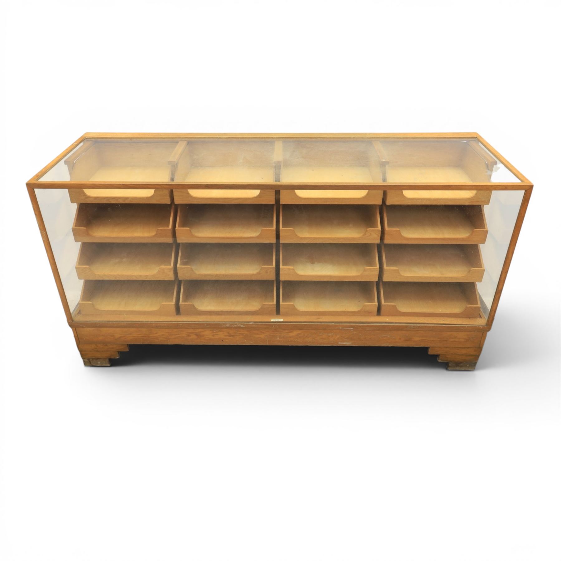 Dudley & Co - early 20th century oak framed and glazed haberdashery shop counter, fitted with sliding tray drawers