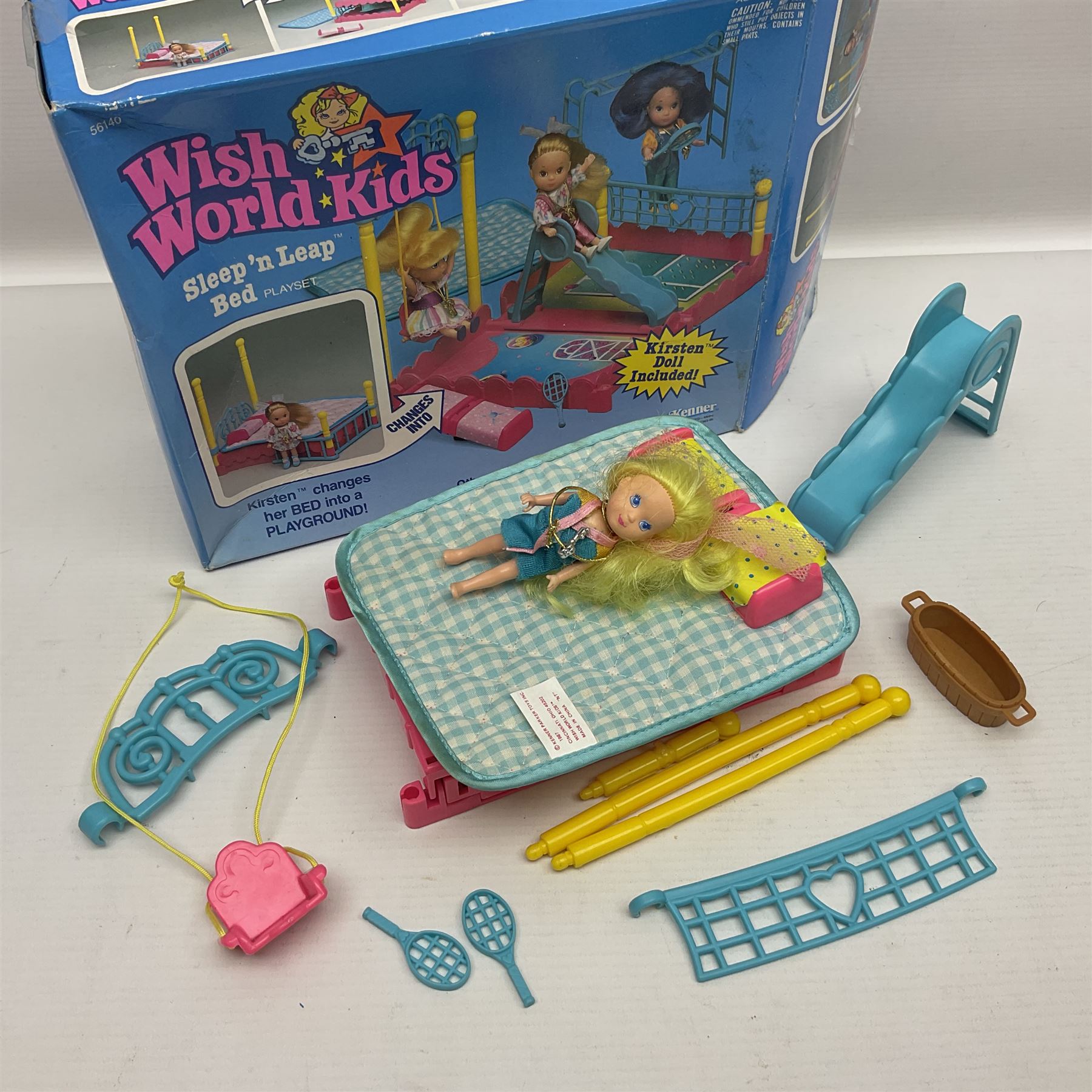 Wish World Kids - Eleven play sets comprising Treats ‘n Sweets Refrigerator, Grin ‘n Win TV, Sponge ‘n Plunge Bathtub, Socks ‘n Locks Dresser, Spice ‘n Slice Stove, Sleep ‘n Leap Bed, File ‘n Smile Desk, Blaze ‘n Braise Fireplace, Hear ‘n Cheer playset in Sponge ‘n Plunge box, two Read ‘n Speed Chair playsets in one box