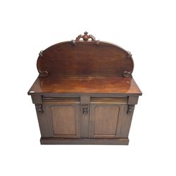Victorian mahogany chiffonier sideboard, raised back with central cartouche pediment, fitted with two two drawers over two panelled cupboards, flanked by foliate corbels