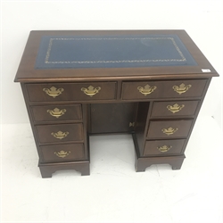 Georgian style mahogany kneehole 'dog kennel' desk, blue leather inset top, two long and six short drawers, single cupboard, shaped plinth base, W91cm, H76cm, D50cm