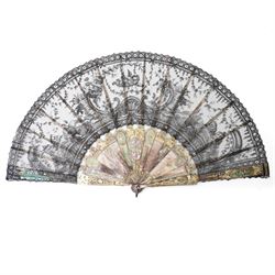 Early 20th century Duvelleroy black lace and mother of pearl fan, the sticks with pierced ...