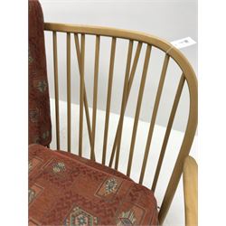 Ercol three seat Windsor sofa with loose cushions, spindle back, turned supports