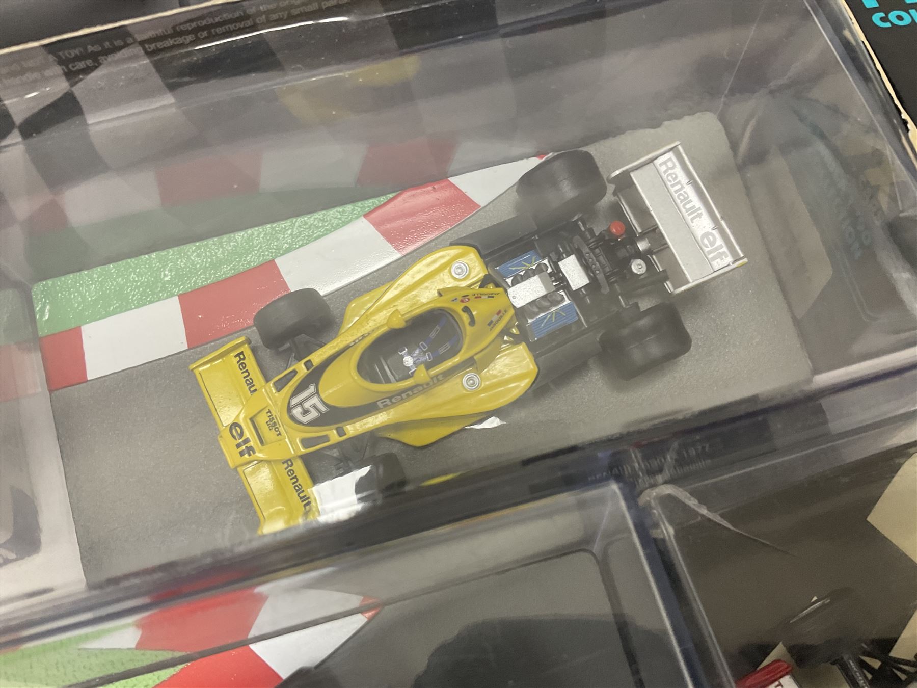 Panini Formula 1 The Car Collection - twelve die-cast models including ten in unopened packaging with periodical; all models in plastic display boxes; and eight other boxed die-cast models of racing cars by Corgi, Onyx, Classico, Minichamps etc (20)