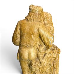 Composite garden statue group of Romeo and Juliet embracing in Medieval dress, surmounted on a naturalistic foliate base, in antique distressed glazed finish