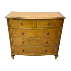 Frank Hudson - mid-20th century Mindi ash and burr walnut 'Spire' bow-fronted chest, featuring a crossbanded top over two short and three long cockbeaded drawers, raised on turned supports  