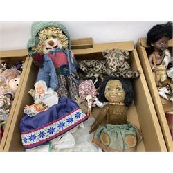 Large quantity of dolls to include oriental examples, native examples, knitted examples etc in four boxes