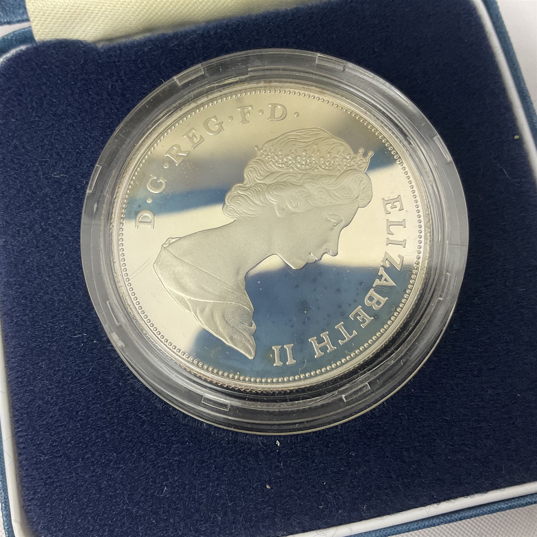 Four The Royal Mint United Kingdom silver proof coins, comprising two 1980 'Her Majesty Queen Elizabeth The Queen Mother' crowns, 1981 'Commemorating The Marriage Of His Royal Highness The Prince Of Wales And Lady Diana Spencer' crown and 1997'Golden Wedding Anniversary' five pounds, all cased with certificates 