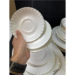 Royal Albert Val D'or part tea and dinner service, including two coffee pots, two teapots, milk jug, covered sucrier etc together with matching items 