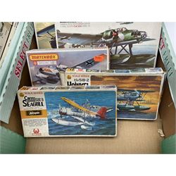 Twelve scale model kits, comprising ten model aircraft kits from Hasegawa, Nichimo, Fujimi and Matchbox, and two further Hasegawa 1:8 scale aircraft mounted machine gun kits, in two boxes 