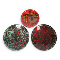 Three Poole Delphis chargers, including Carol Culter and others, largest D26cm
