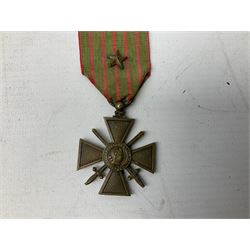 Five continental medals - WW1 Belgian Cross of Fire; WW1 French Croix De Guerre; French Croix De Combattant; French Republic Workers silver merit awarded to L. Mounet 1950; and boxed French Palmes Universitaires Officier d'Academie silver and enamel wreath (5)