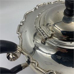 1920s five-piece silver tea service, comprising teapot, coffee pot, hot water pot, twin handled open sucrier and milk jug, each of squat circular form with shaped rim, the teapot, coffee pot and hot water pot each with ebonised handle and finial, the sucrier and milk jug with acanthus capped scroll handles, all upon circular foot, hallmarked R F Mosley & Co, Sheffield 1926 & 1927, tallest H24cm