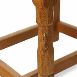 Mouseman - set of six oak dining chairs, pierced and carved lattice back over leather upholstered seat, on octagonal front supports united by stretchers, carved with mouse signature, by the workshop of Robert Thompson, Kilburn 