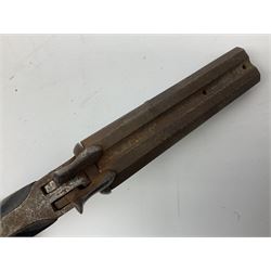 19th century Belgian 9mm side-by-side double barrel pin-fire pocket pistol with 11cm octagonal single block barrel, drop-down triggers and carved walnut stock L22.5cm overall