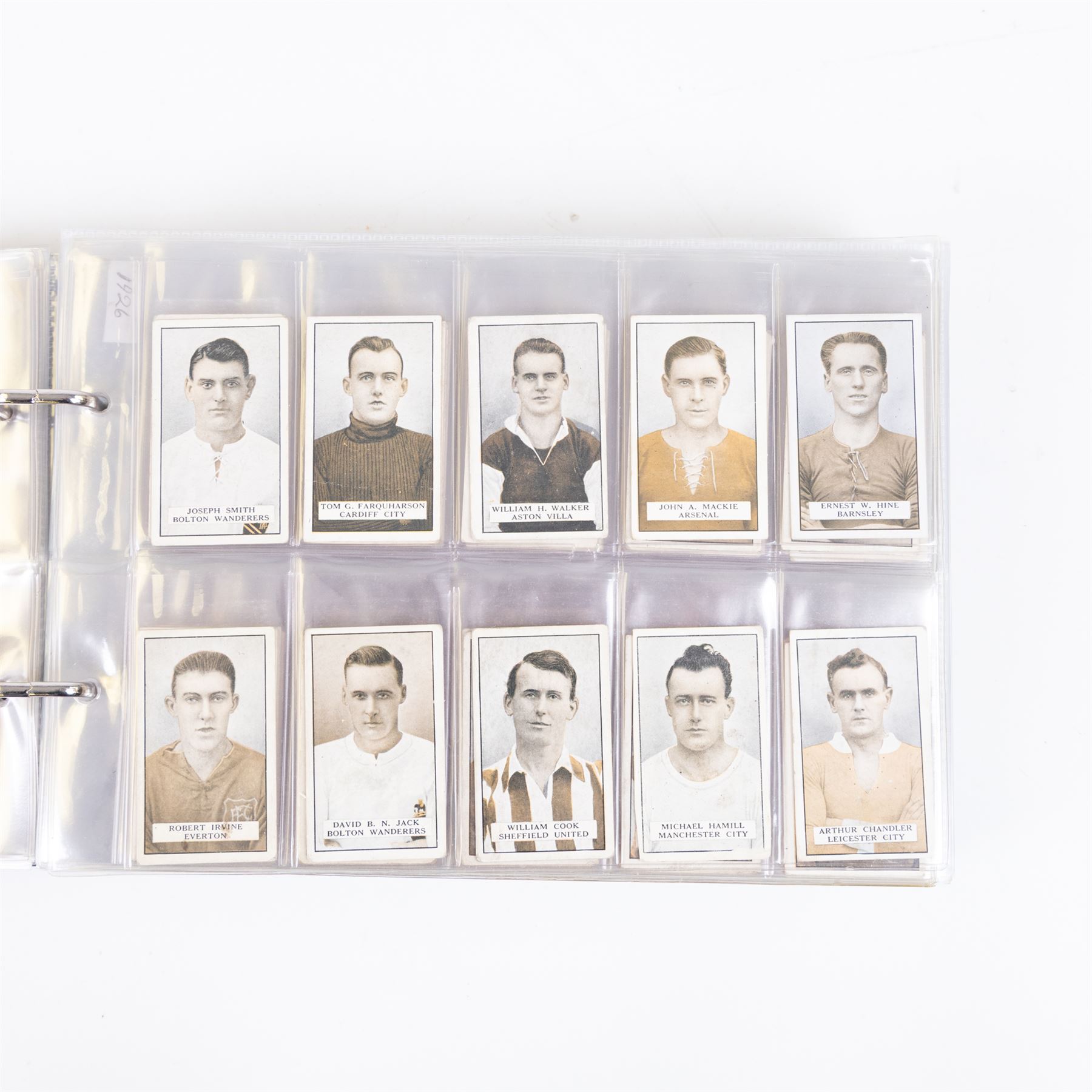 Collection of Edwardian and later Football related trading and cigarette cards, including forty-nine of fifty 1906 Ogden's Football Club Colours, 1922 PALS Footall series, ninety of one hundred 1925 Gallaher Famous Footballers, complete set of forty-four 1926 Ogden's Captains of Association Football Clubs and Colours, complete set of fifty 1927 Players Football Caricatures by MAC,  complete set of fifty 1927 Players Football Caricatures by RIP,  complete set of fifty 1930 Players Association Cup Winners, complete set of 50 1933 Ogdens AFC Nicknames etc, housed in brown cigarette card album
