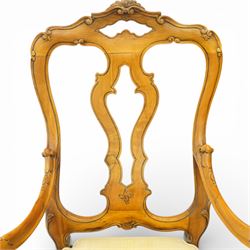 Pair of Italian carved walnut open armchairs, upholstered seats