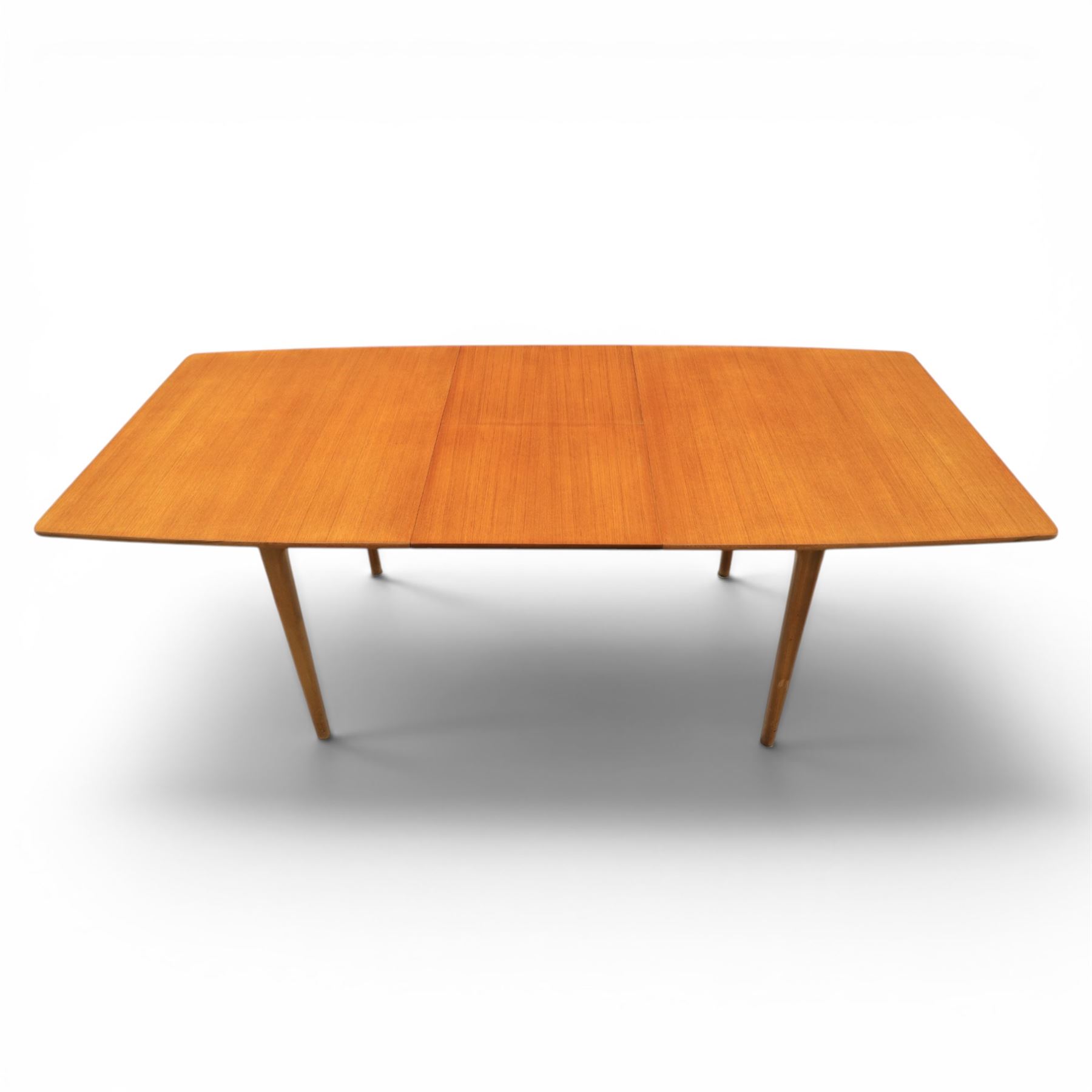 A.H. McIntosh - Mid-20th century teak extending dining table and four chairs, teak top table with internal fold over leaf extending to 193cm, raised on cylindrical tapering supports