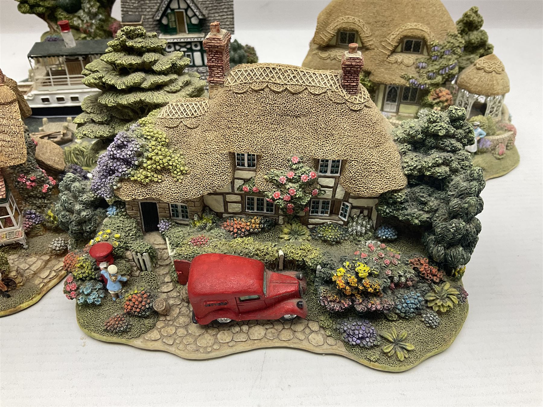 Five Lilliput lanes, comprising Queen of Windermere, Pen Pals, Two Pints Please, Burley Street and Sweets & Treats, all in original boxes  