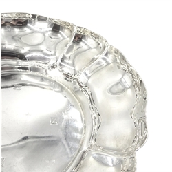 Silver dish by Barker Ellis Silver Co, Birmingham 1974, silver pedestal dish by E H P Co Ltd, Sheffield 1975 and one other, approx 14.2oz