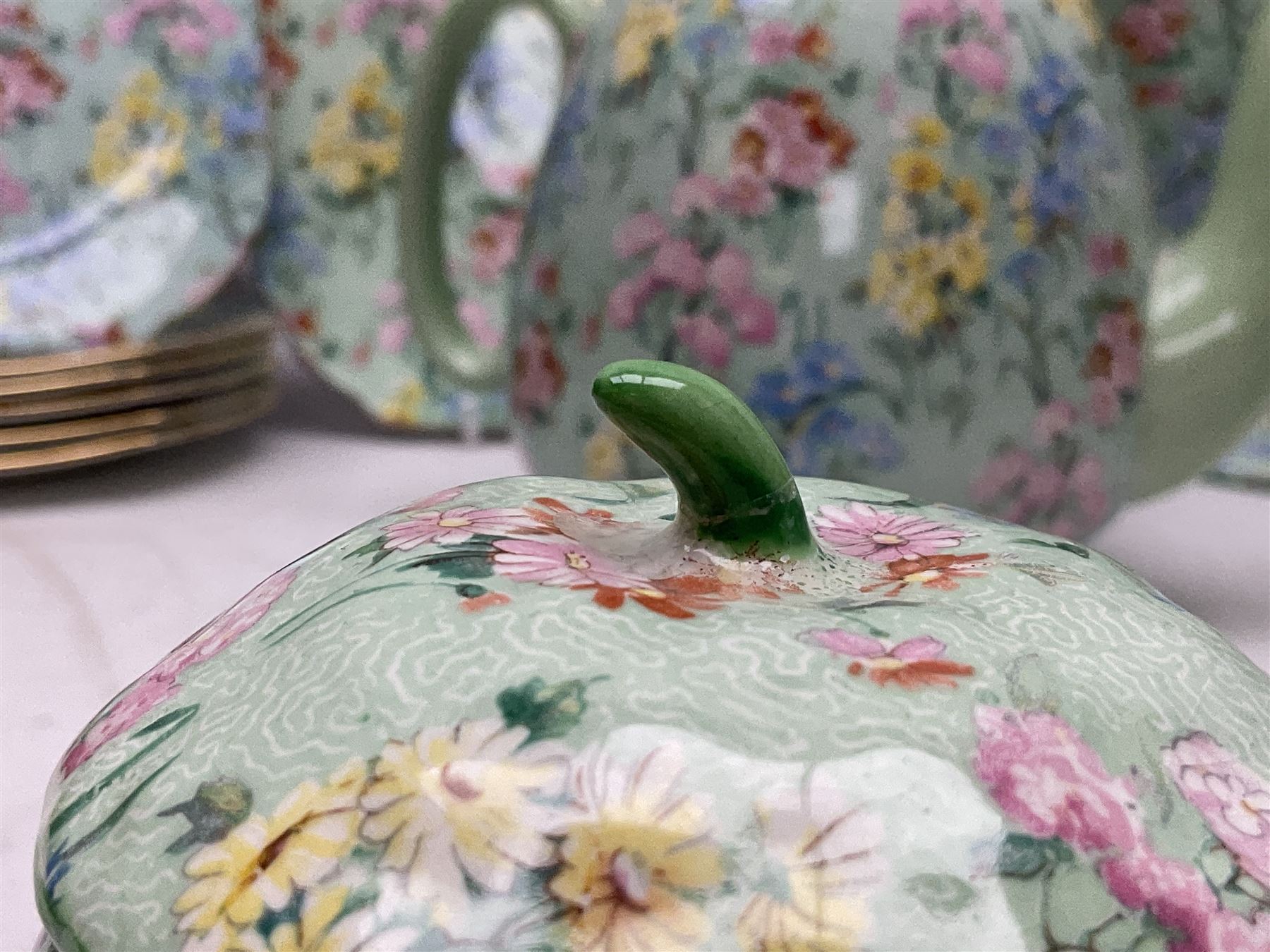 Shelley Melody pattern tea service for six, to include teapot, teapot stand, hot water jug, milk jug, covered sucrier, teacups and saucers, cake plates etc (31)