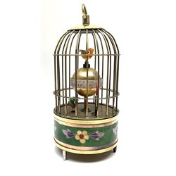 Automation bird cage of predominantly brass construction with central rotating orb and two birds with painted and feathered decoration, H17cm