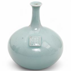 Poh Chap Yeap (Chinese/British 1927-2007); celadon glazed plate and solifleur vase, the plate decorated with a branch of cherry blossom, incised signature to bases, plate D29cm, vase H11cm (2)