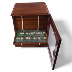 Victorian collector's specimen cabinet, containing a number of prepared microscope slides including miniature photographs, animal and human pathological, physiological and histological specimens and botanical specimens, mostly annotated in ink, the cabinet with glazed door, the drawers with bone handles and lined with green felt, owned by Dr Arthur Bristow, together with a picture of the doctor, cabinet H43cm