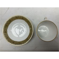 WW2 Nymphenburg cups and saucer, decorated with Imperial German Iron Cross encircled in a foliate boarder with gilt edging, with printed mark beneath 