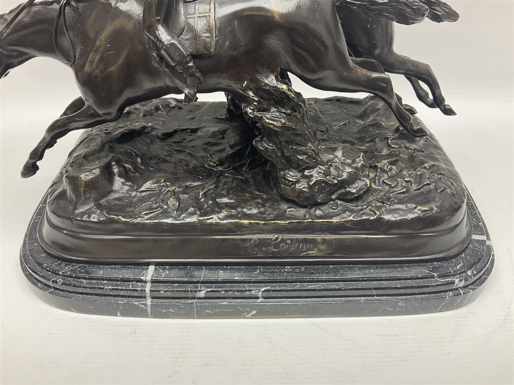 After E Loiscay, bronzed figure group, modelled as two race horses, signed E Loiscay, upon a stepped marble plinth, overall H28cm