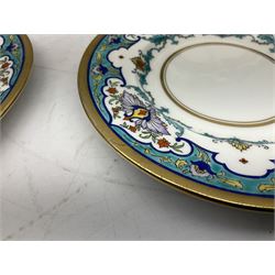 Four Minton plates, comprising three tea plates and one serving plate, hand painted with floral and scroll border and gilt edging, with printed mark beneath and retailer's mark for W.H Plimmer & co, New York City, largest plate D31.5cm
