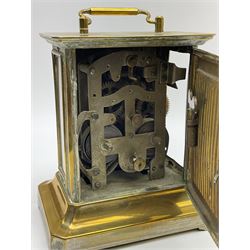 Late 19th century German Junghans “Joker “carriage clock with a musical alarm, engraved rectangular dial plate, circular card dial within an integral glazed bezel, roman numerals, minute track and alarm dial, steel spade hands, glass side panels (one missing) and rear case door, thirty-hour spring driven movement, pin pallet balance escapement, rear wound and set. 
With key.

