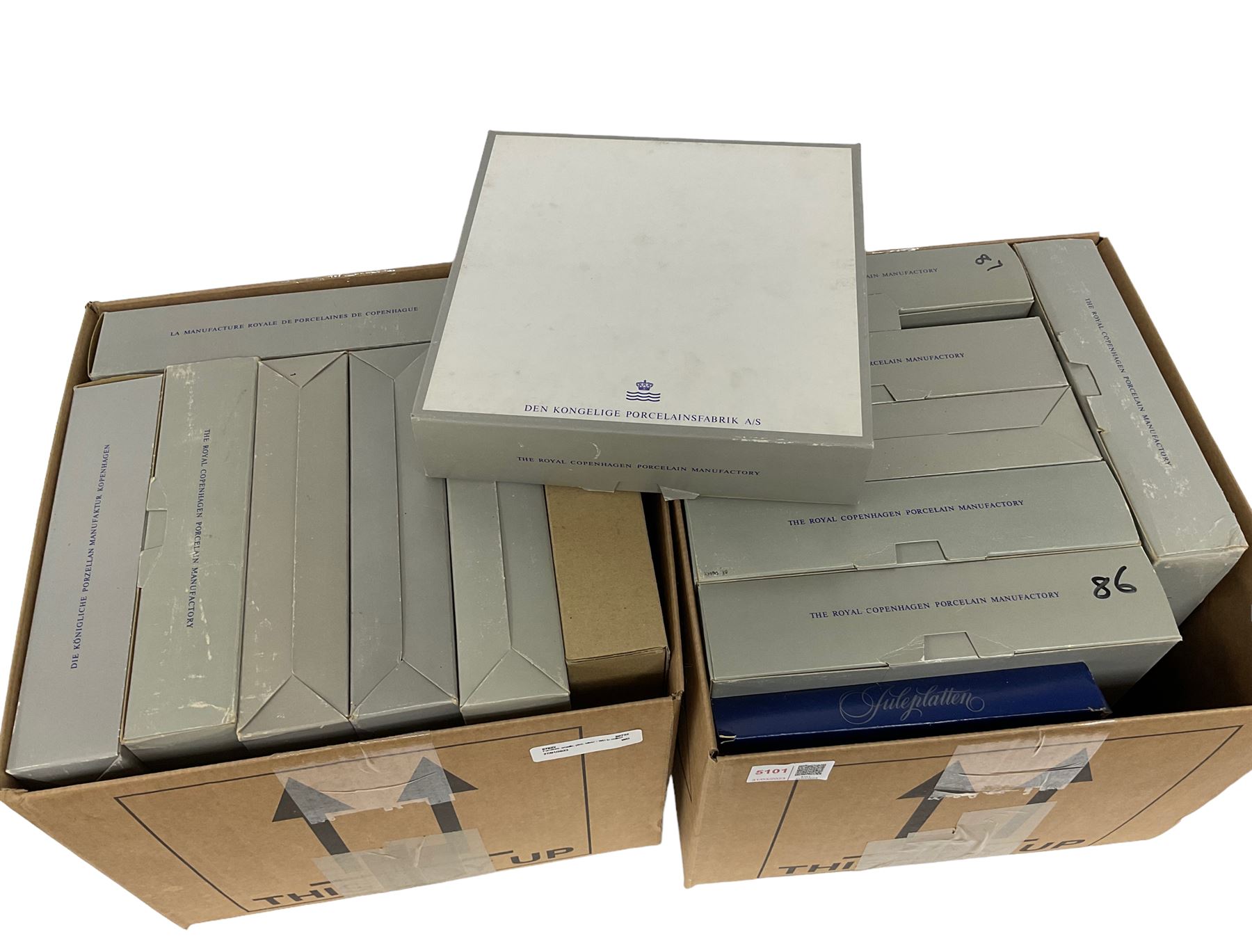 Fifteen Royal Copenhagen Christmas plates of various sizes, all with original boxes, in two boxes 