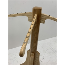 *Light ash wood clothes stand, four out splay branches, on cruciform base, H128cm, W100cm