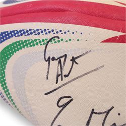 Three signed rugby balls, including 2017 Lions Tour Rhino Jumbo ball, signed by eight players, including Greig Laidlaw, Rugby world cup 2003 example and a 2001 British Lions example