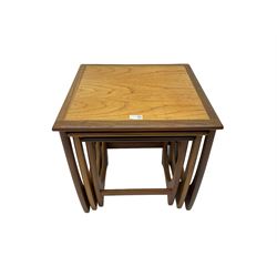 G-Plan - 'Astro' mid-20th century teak nest of three tables, square top over curved u-shape supports united by stretcher