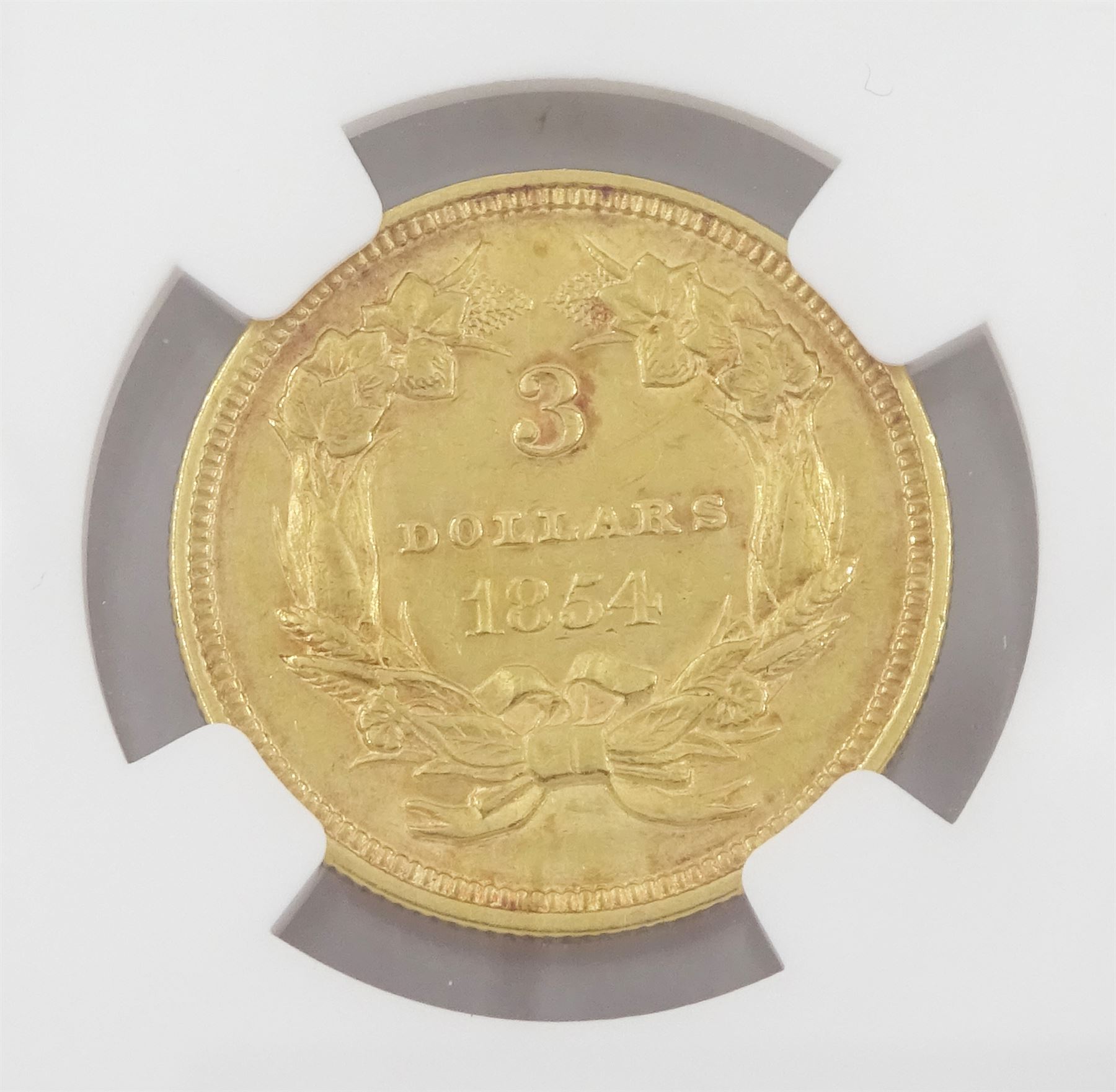 United States of America 1854 gold three dollar coin, encapsulated and graded AU55 by NGC