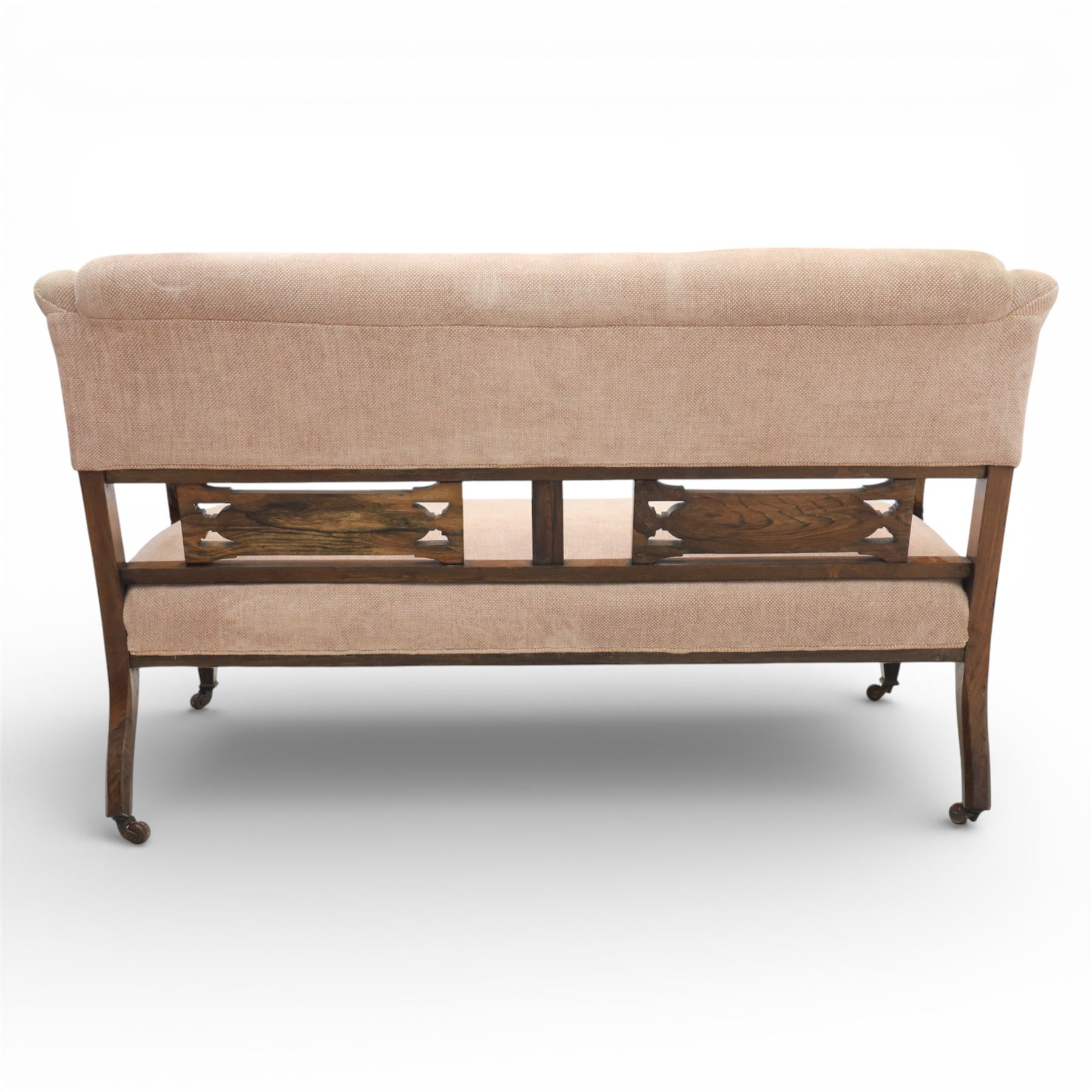 Quality Edwardian seven piece inlaid salon suite, comprising three seater settee, pair of arm chairs and four chairs with pierced splat backs, upholstered in pale pink fabric, inlaid with flowering urns, upon tapering legs with spade feet and castors