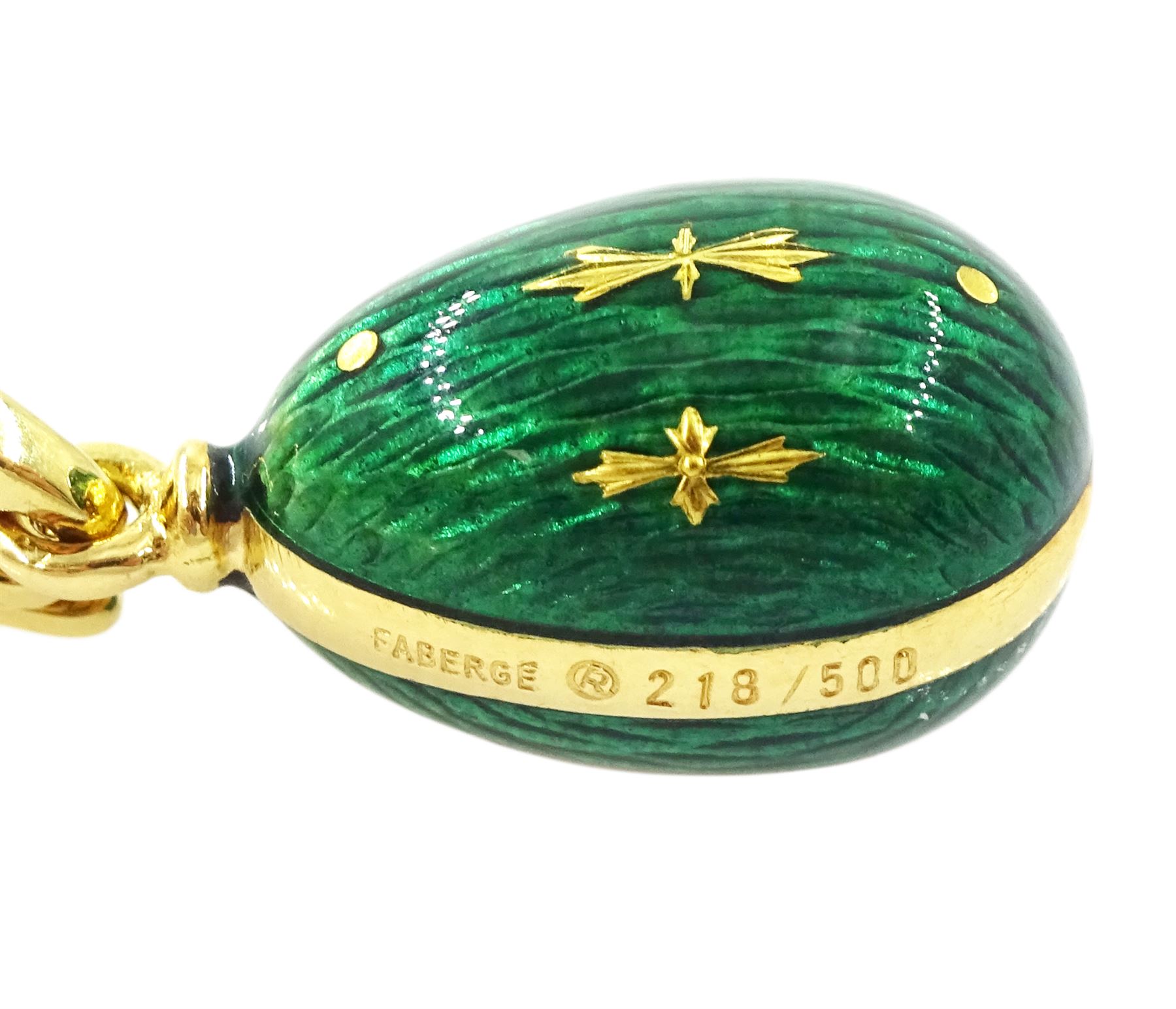 Fabergé 18ct gold enamel egg pendant, Ref. F-1310, green guilloche enamel egg, with hinged bail, designed by Victor Mayer for Fabergé, on 18ct gold wheat chain necklace, boxed with papers