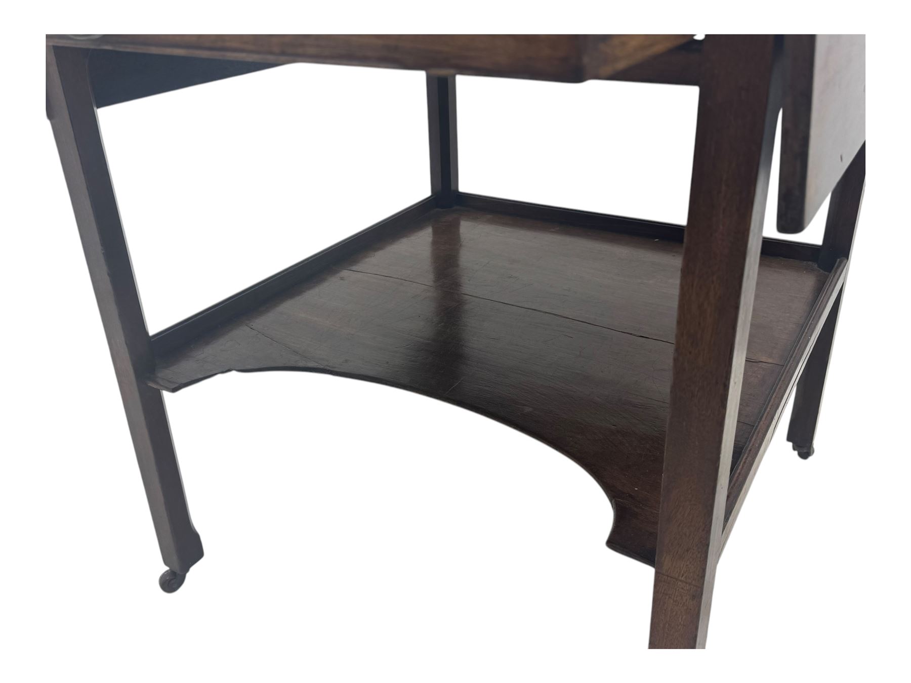 Georgian design mahogany drop-leaf table, rectangular top above a single drawer with brass handle, square supports united by arched undertier, on brass castors (W62cm, D65cm, H72cm); and a smaller mahogany drop-leaf table with single drawer on turned supports (W43cm, D61cm, H72cm)