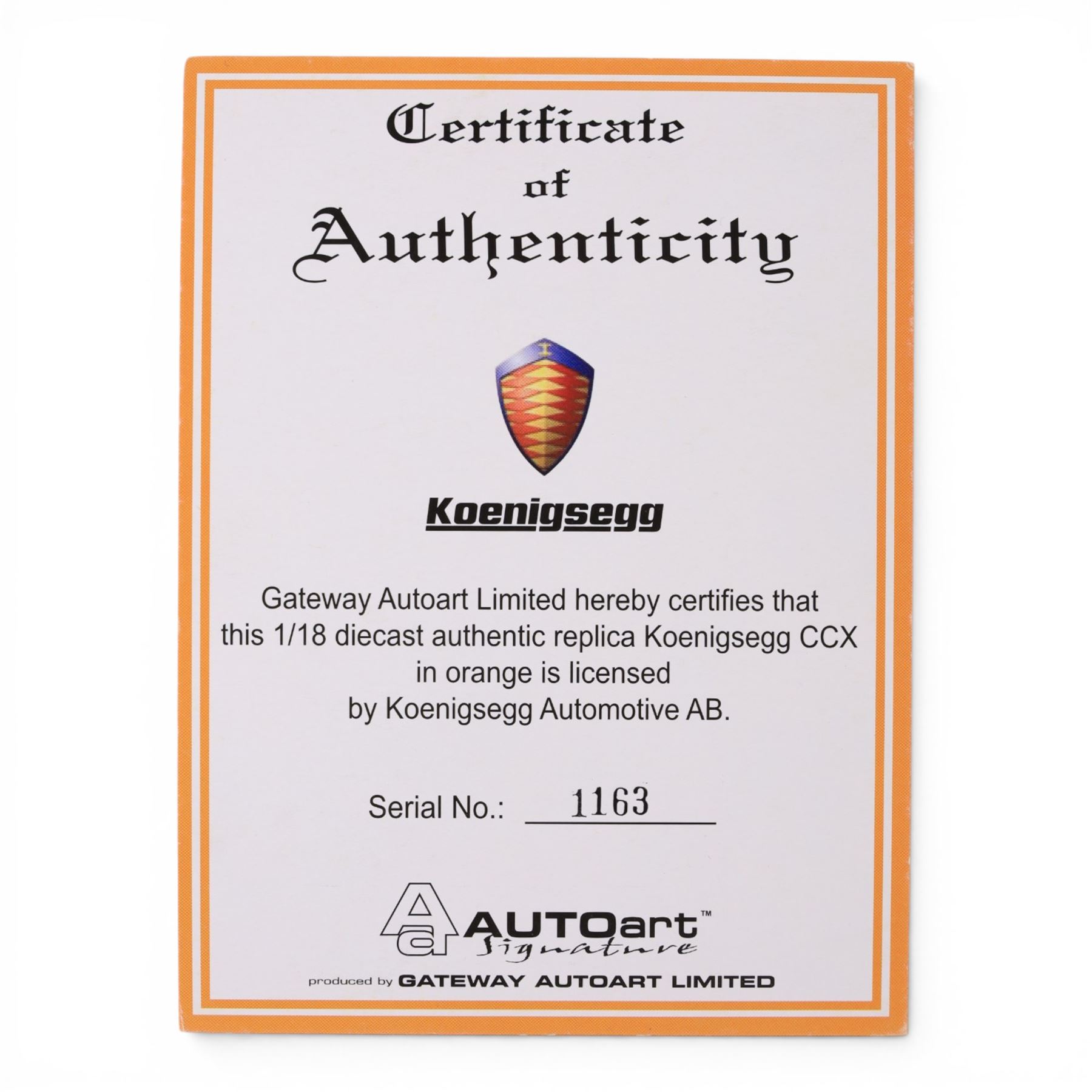 Autoart Signature 1:18 scale Koenigsegg CCX in orange, serial no. 1163, boxed with certificate of authenticity