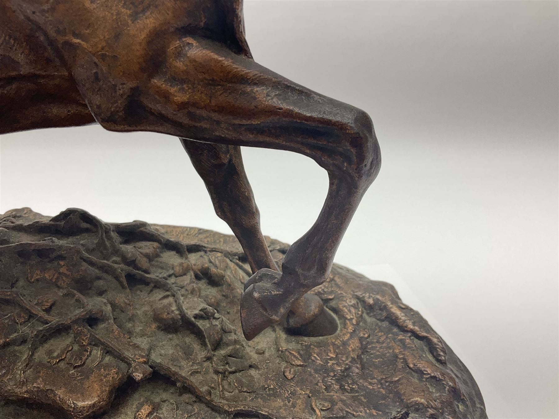 After P J Mene, bronze figure of a horse on a stepped oval base, H31cm 