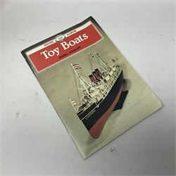 Twenty six tinplate models to include Ferris Wheel and Performing Circus Elephant, marked JW, further similar examples such as Duck on a Bike, Clown on Roller, Carousel; Popeye Tin Speedboat; Looney Tunes Wind Up Cars and Express Train; various international examples, MS107 Jumping Bambi, Pop Pop Boat, jumping frogs, pecking chickens etc; both boxed and loose